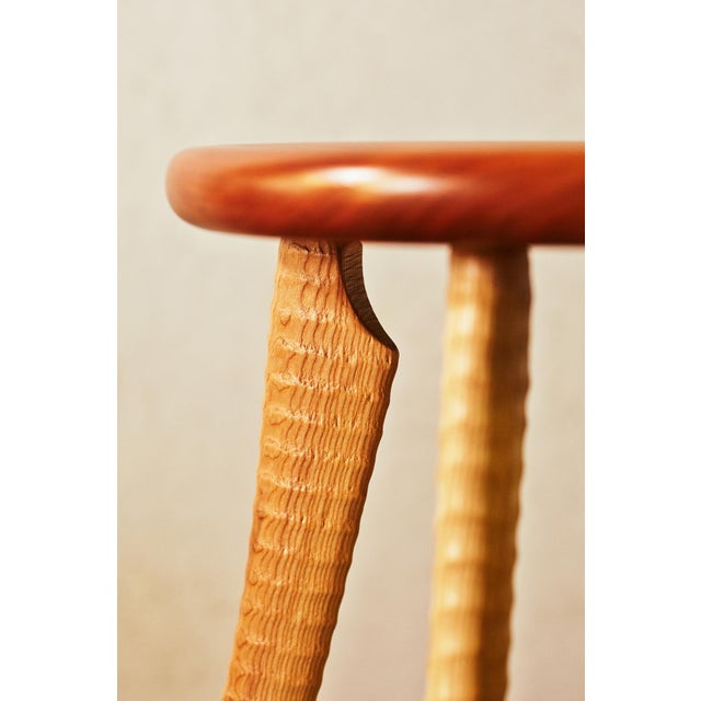 The Ax Handle Stool is one of Bradford Woodworking’s signature pieces. New life and purpose is given to the ax handles...