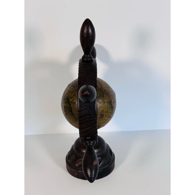 Bring a touch of maritime charm to your home or office with this distinctive vintage desktop globe from the 1970s....