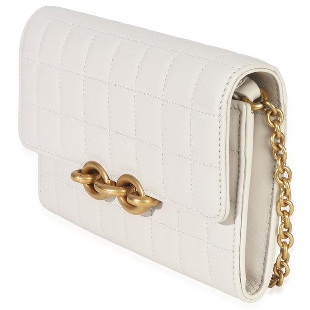 Item #: 152438 Interior Material: Leather MSRP: 2,100 Features Interior: One zip pocket. Two slip pockets. Six card slots...