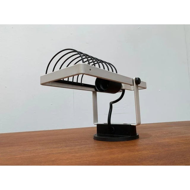 Rare wall lights from the Sintesi series of the Italian manufacturer Artemide after a design by Ernesto Gismondi from the...