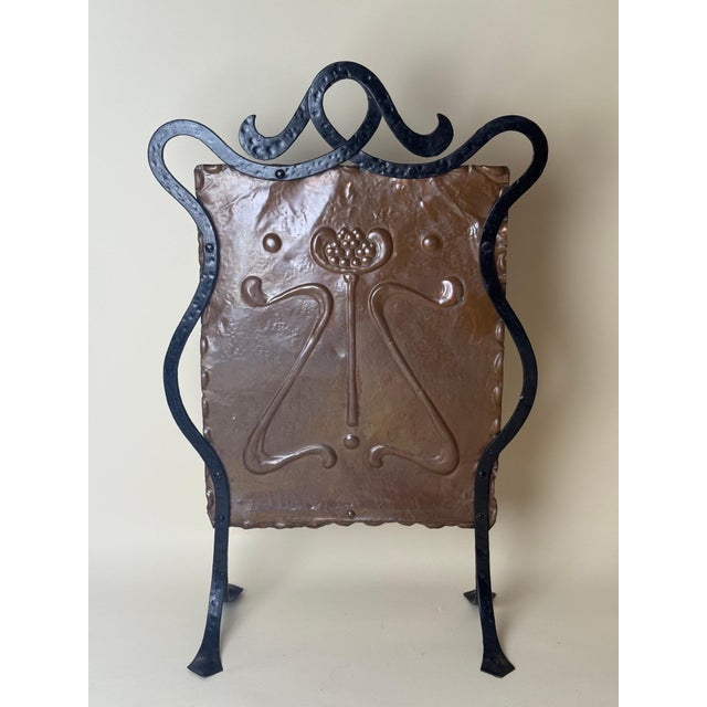 A remarkably decorative and authentic original Jugendstil (Art Nouveau) fireplace screen, dating to the early 20th...