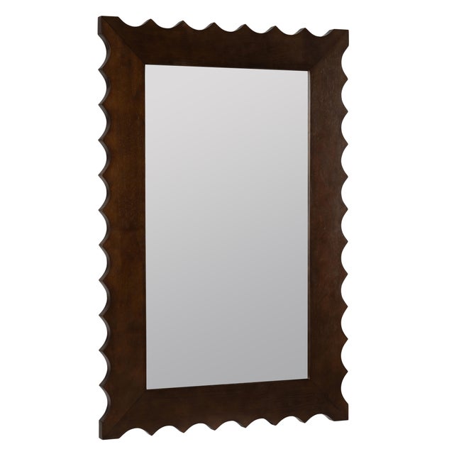 Beautiful handcrafted wood wall mirror with an edgy frame. Material: Tropical Hardwood Finish: Dark Wood Item Bevel: No...