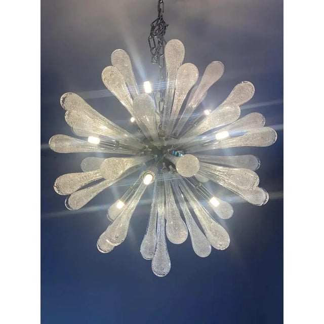 Contemporary sputnik chandelier with transparent ” big drops ” in pulegoso traditional working of murano glass, with...