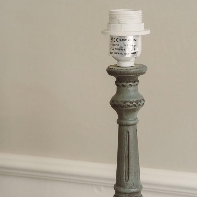 Table lamp base in grey-green with neoclassical ornamentation — columnar shaft, acanthus leaf baluster, square base with...