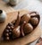 ​A quintessential statement piece of mid-century tropical modernism, this striking 8-piece hand-carved monkey pod wood...