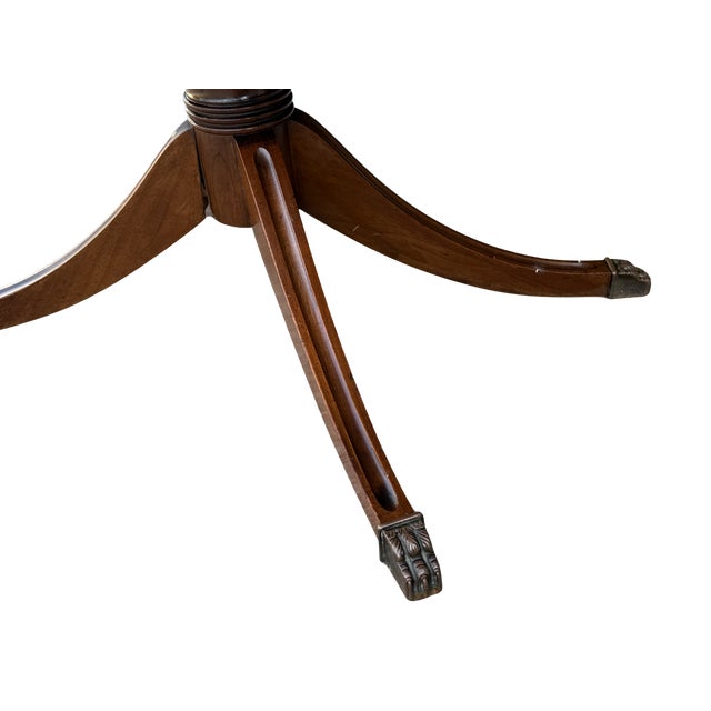 Wood Vintage Duncan Phyfe Style Mahogany Oval Coffee Table – Federal Neoclassical Pedestal Base With Reeded Saber Legs & Brass Claw Feet For Sale - Image 7 of 9