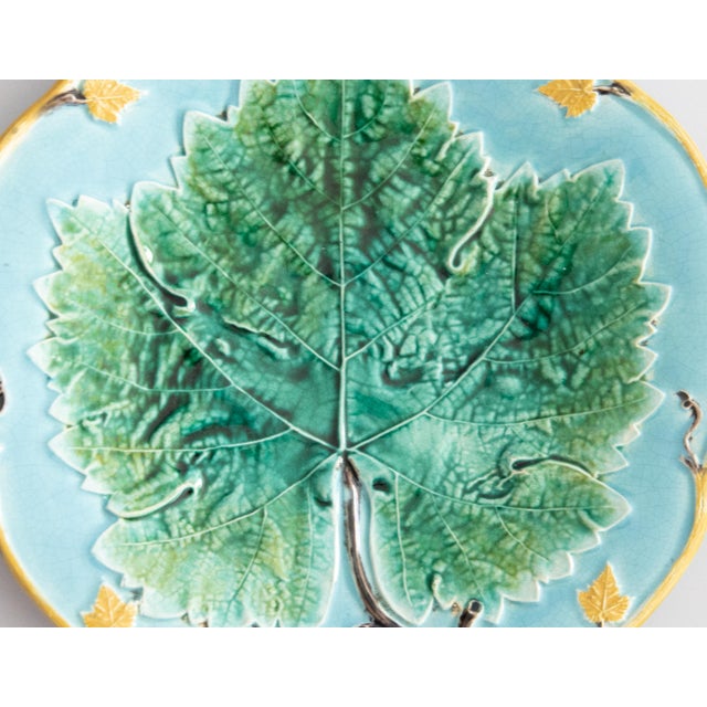 A lovely rare antique English turquoise majolica green leaf scalloped plate attributed to George Jones, circa 1880. No...
