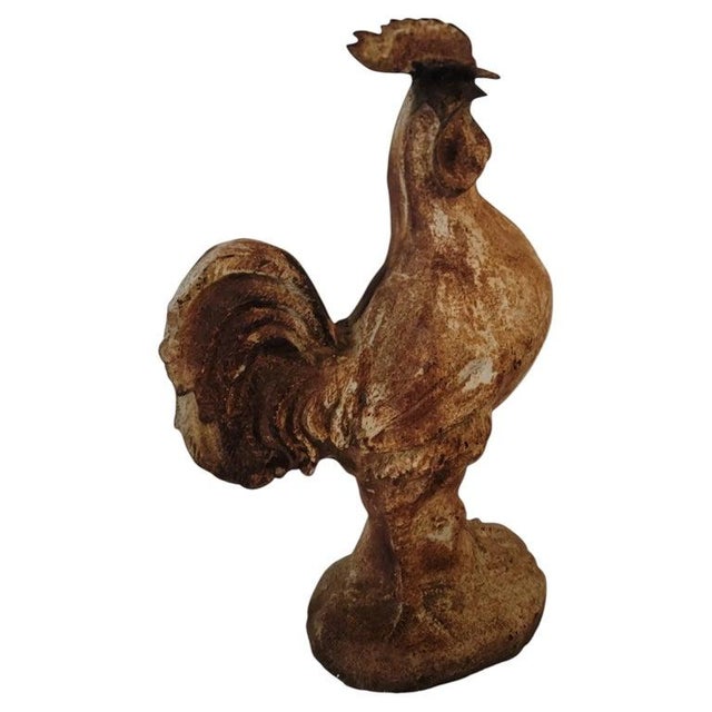 This late 19thc cast iron rooster with original worn patina and fantastic surface.The form is the best and was probably a...