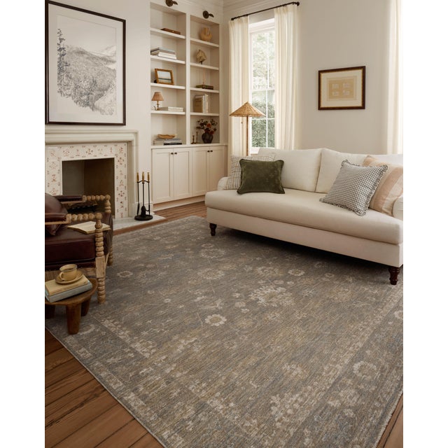 The Louisa Collection is a serene area rug based on beautiful, traditional Turkish designs updated in calm colorways by...