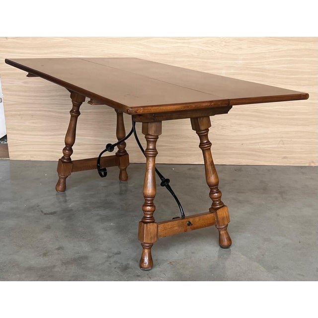 20th century Spanish console fold out farm table Works as both a dining table and console. Opened wide : 32in From the...
