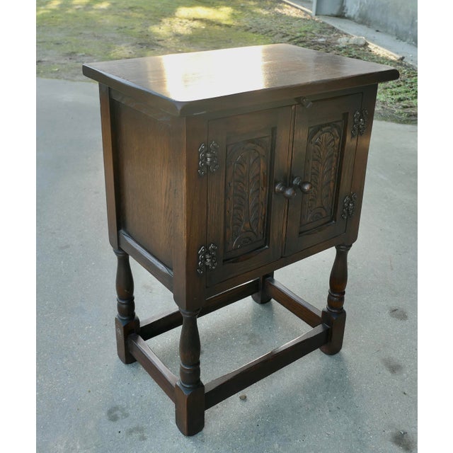 Gothic Oak Cupboard by Bevan Funnel Ltd A Charming little piece dating from about 1940 made by Bevan Funnell Ltd, the...