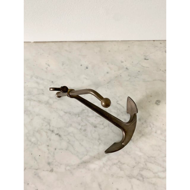 A beautiful brass anchor paperweight Circa 1980s Measures: 9"W x 5.75"D x 7"H. Very good original vintage condition.