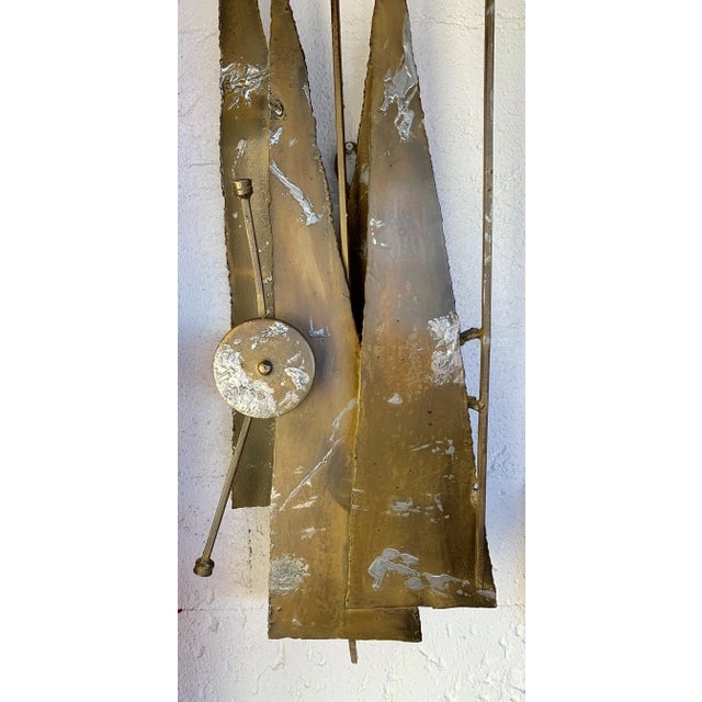 A vintage 1970s Brutalist metal wall sculpture. Patinated metal, likely iron by the weight, It is not signed that we can...
