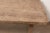 This vintage Chinese writing table is crafted from solid elmwood, dating to the first half of the 20th century. The broad...