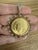 A magnificent and distinctive 1932 United States $10 Indian Head gold coin pendant, framed within an elaborately detailed...