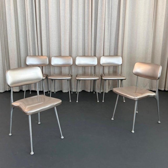 This set of six, mid-century modern "Gazelle" side dining chairs were manufactured by furniture maker Shelby Williams. The...