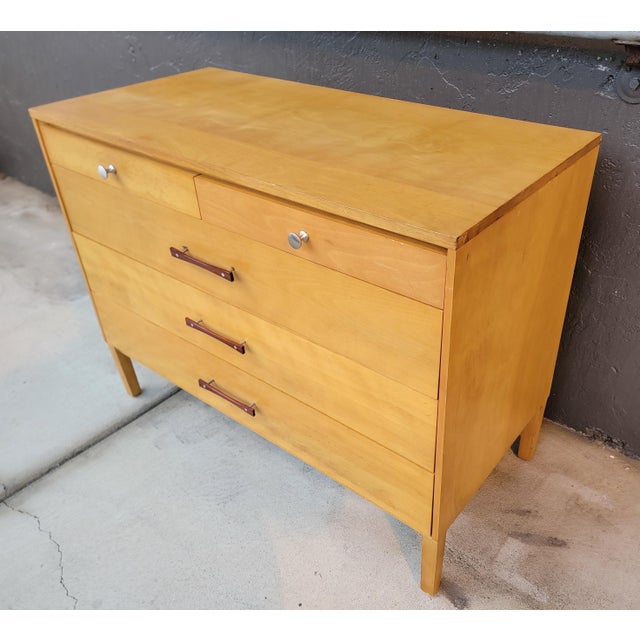 A nice, original example of a Paul McCobb "Perimeter Group" 5 drawer dresser. Original finish and original pulls. Made of...