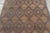 Made with handwoven reed and camel leather in Mauritania circa 1950-1960, this 3x5 vintage Tuareg mat is an exceptional...