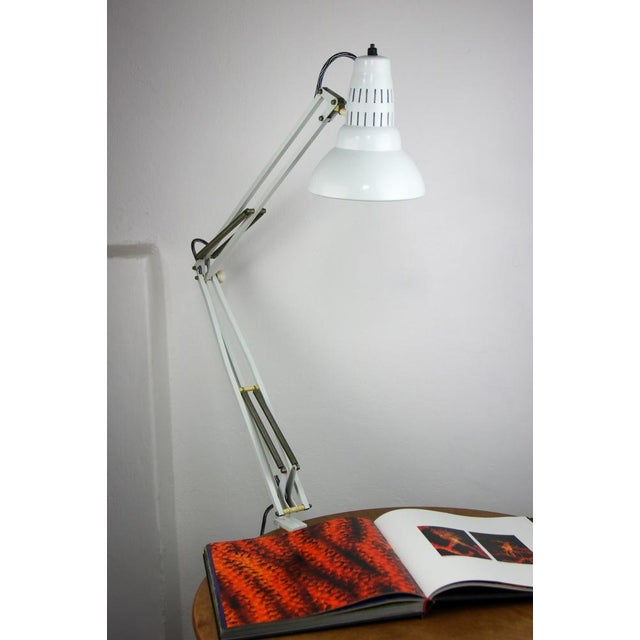 White Adjustable Achitect Table Lamp, 1970s, in Very Good conditions. Designed 1970 to 1979 European Plug (up to 250V).The...