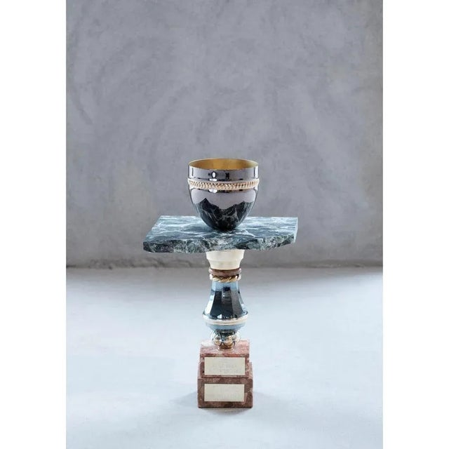 The Green marble flower pot by Flétta Dimensions: 40 x 20 cm Materials: green marble Trophy is a collection of tables,...