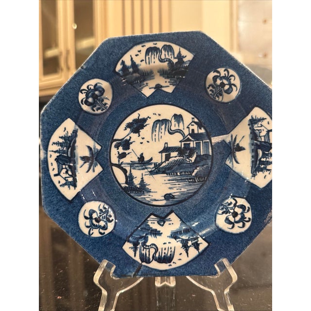 A beautiful and rare 18th Century George III English porcelain plate in an octagonal form. Hand-painted in rich cobalt...