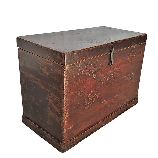 This early 20 century trunk is adorn with embossed objects and deep brown color and rich texture. Solid structure. It...