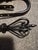 Pair of vintage, unused Drape holders or wall hooks. Black, , can be painted.