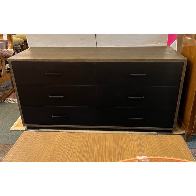 Design Plus Gallery presents the Baldwin Dresser by Brownstone. The crisp silhouette is simplicity defined by richly...