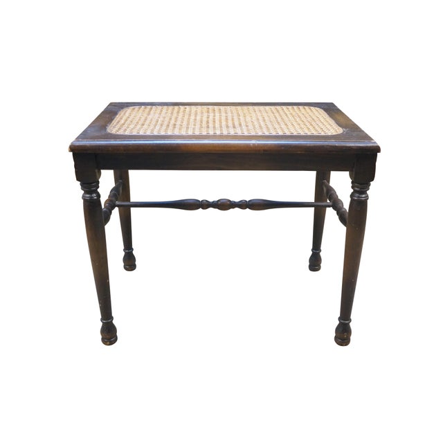 Circa mid 20th century hardwood piano / vanity bench / stool - rectangular form with turned legs and stretcher with caned...