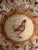 The product is a set of two vintage John Derian decoupage signed rooster plates, measuring 8.5 inches in diameter. Made in...