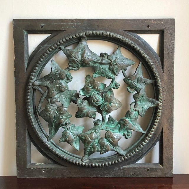 Offering a large, late 19th-century cast bronze architectural element. This beautifully crafted bronze panel features an...
