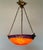 Offering a vibrantly colored antique French lighting bowl in mottled red/oranges and blue/purples, in the manner of...