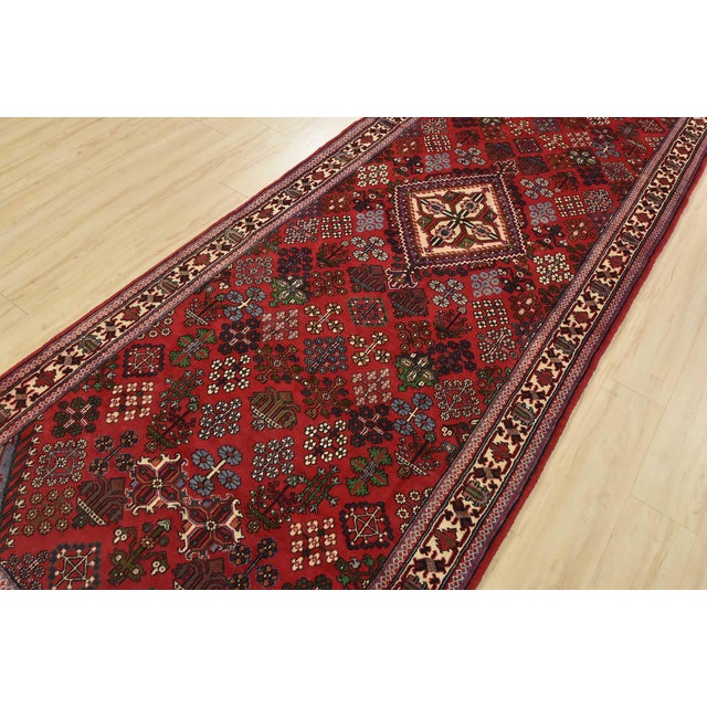 It has a full wool pile with no worn areas and is in very good condition.