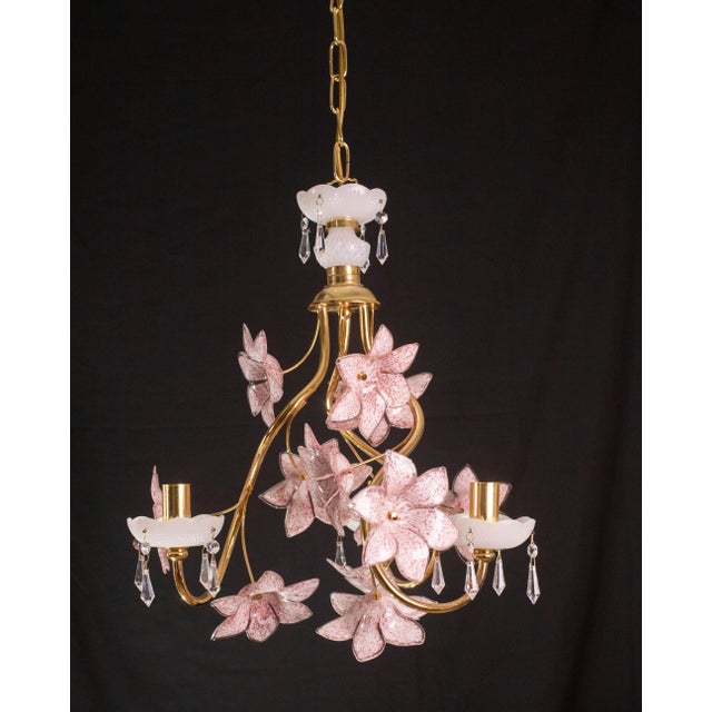 Vintage Murano glass chandelier with pink flowers. The chandelier has 3 light point with E14 socket. The frame is made of...