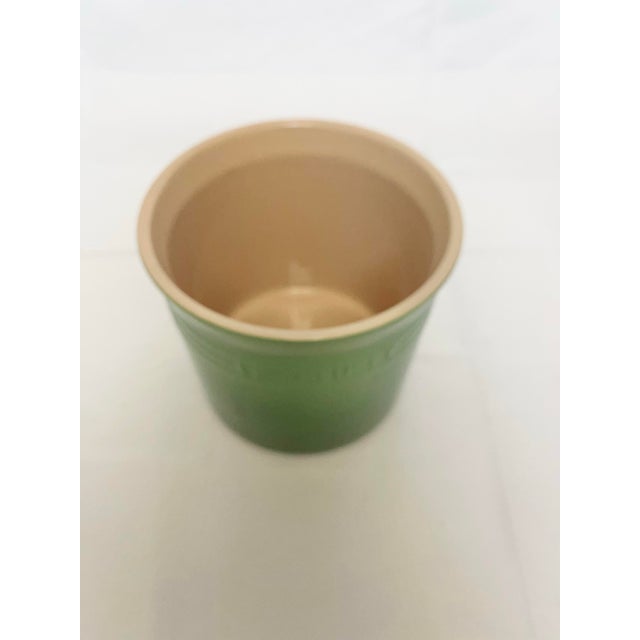 Add a touch of French country charm to your home with this vintage Le Creuset stoneware cachepot in a beautiful glossy...