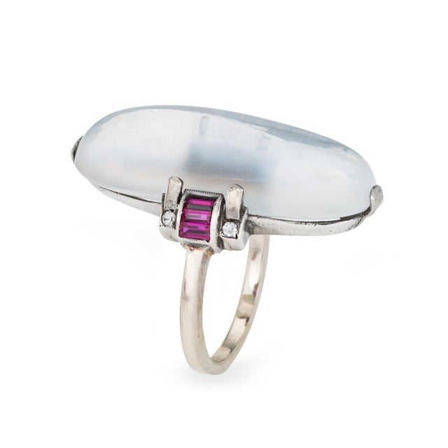 Stylish Retro vintage cocktail ring crafted in 10k white gold (circa 1940s). Cabochon cut moonstone measures 28mm x 9mm...