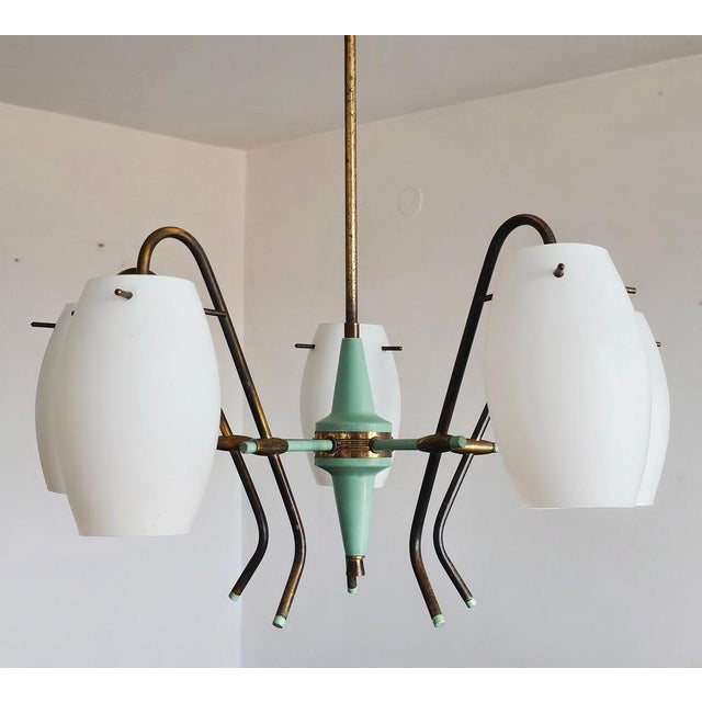In this listing you will find a very rare 5-arm Mid Century Modern chandelier manufactured by Stilux Milano, the main...