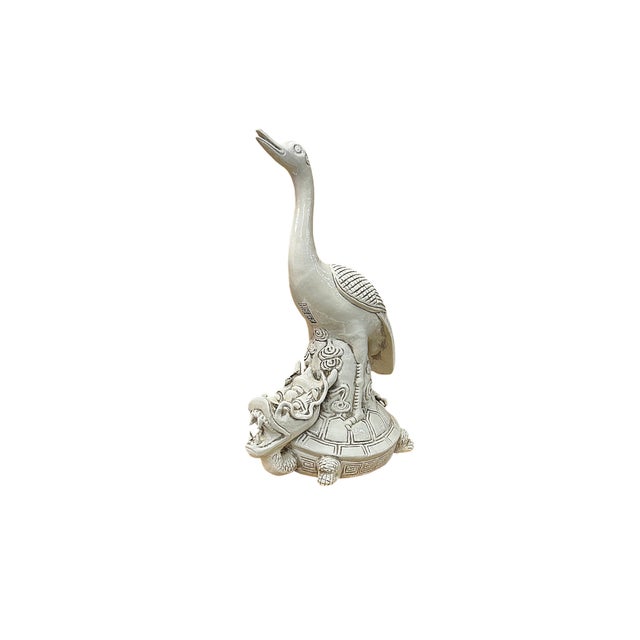 This exquisite ceramic sculpture vividly depicts a traditional East Asian auspicious motif, featuring a crane standing...