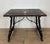 Elegant Spanish Baroque style side table featuring a richly decorated marquetry top with floral inlay centered by an urn...