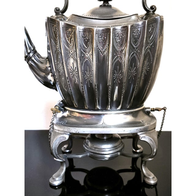 A fine Victorian example of English Britannia metalwork — both a functional service piece and a decorative collector’s...