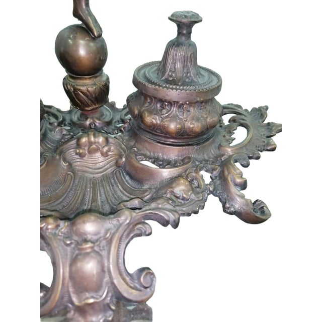 Inkwell Lamp in Chiselled Bronze with Putto, in Flawless conditions. Designed before 1890 European Plug (up to 250V).The...