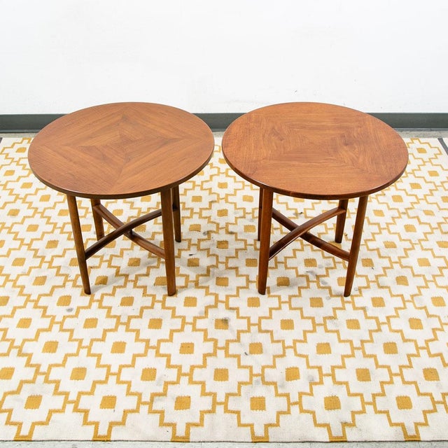 Rarely seen round walnut end tables by Drexel for the parallel line. These tables rarely come up and look great in any...