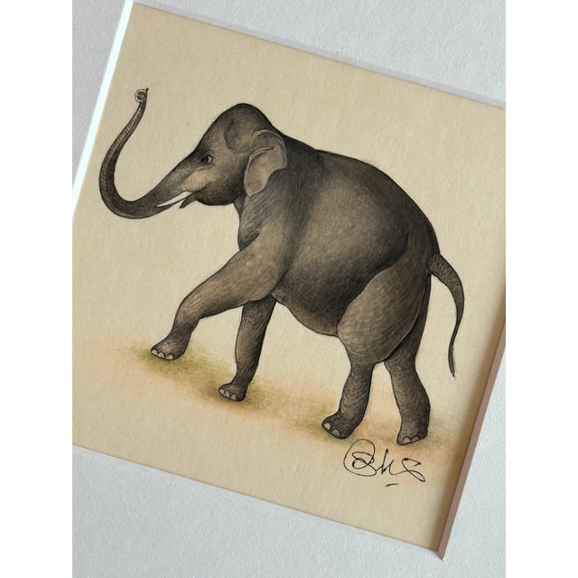 This exquisite miniature painting beautifully captures the essence of an elephant with extraordinary detail and finesse....