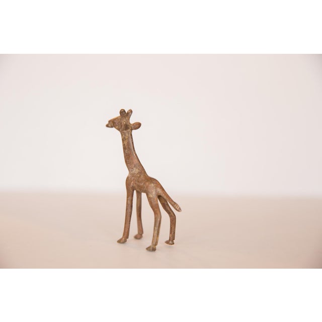 :: Vintage handmade copper sculpture of a giraffe. Circa mid 20th century and possibly older, this piece has such...