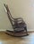 A very beautiful rocking chair with ornate design features. Hand crafted with attention to details. Was my Mother's who...