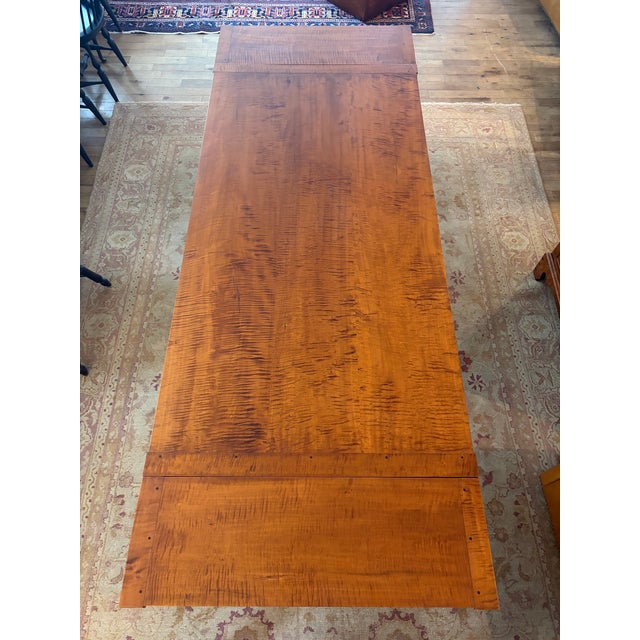 For sale in Sunapee Harbor is a custom made Tiger Maple Dining Table. This table was custom made by David LeFort in 2002...