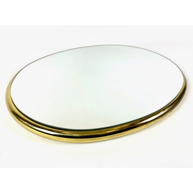Mid-Century German Brass Eliptical Wall Mirror from Planilux Huwa Spiegel, 1960s, in Very Good conditions. Designed 1960...