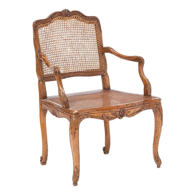 Louis XV Style Carved Walnut and Cane Fauteuil For Sale