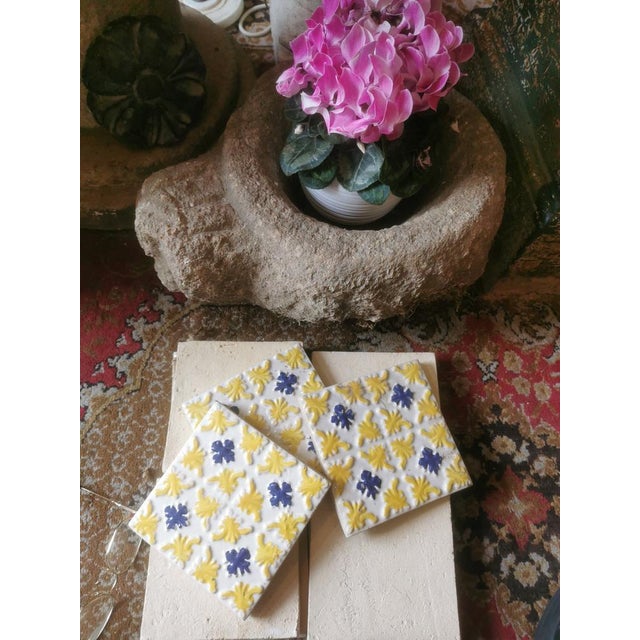 this set of tiles are a real treasure. handmade and never used before.