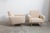 Highly refined vintage lounge chairs, a sculptural set of 2 chairs, reupholstered in ecru velvet, standing on chromed legs...